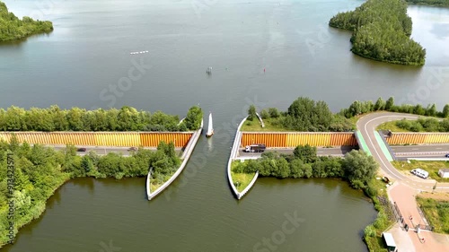 Drone top view Aqueduct, Aerial view from the aqueduct in Harderwijk at the Veluwemeer in the Netherlands. Aqueduct waterway and highway blinding together in summer photo