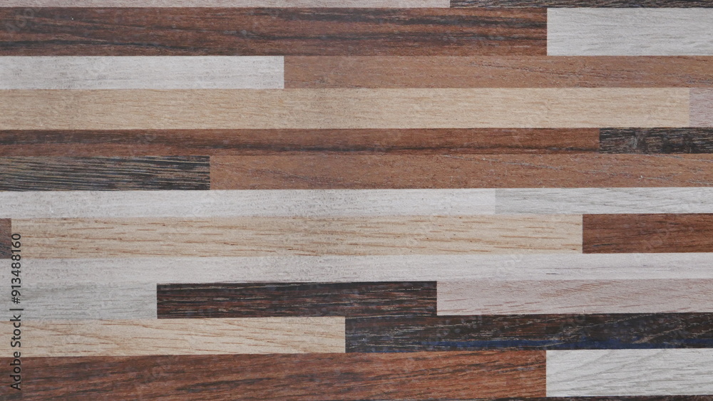 A wood grain patterned background with a variety of wood grain patterns. The background is a mix of different wood grain patterns, creating a visually interesting and diverse look A wood grain patterned background with a variety of wood grain patterns. The background is a mix of different wood grain patterns, creating a visually interesting and diverse look