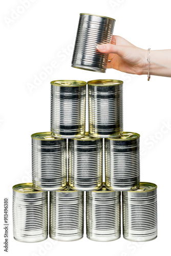Hand holding a single food can with 9 stacked isolated in a white background