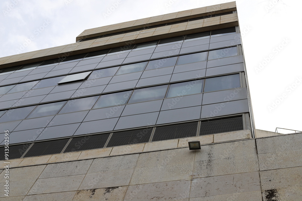 Obraz premium Architectural details of tall buildings and structures close-up.