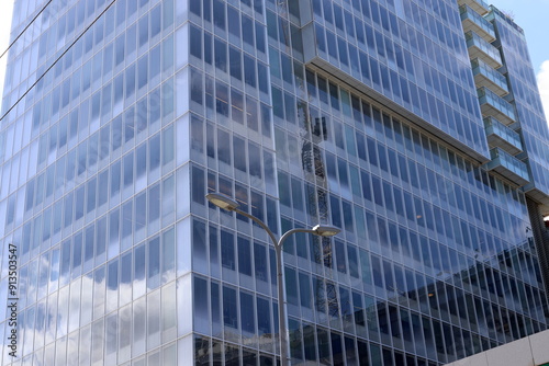 Architectural details of tall buildings and structures close-up.