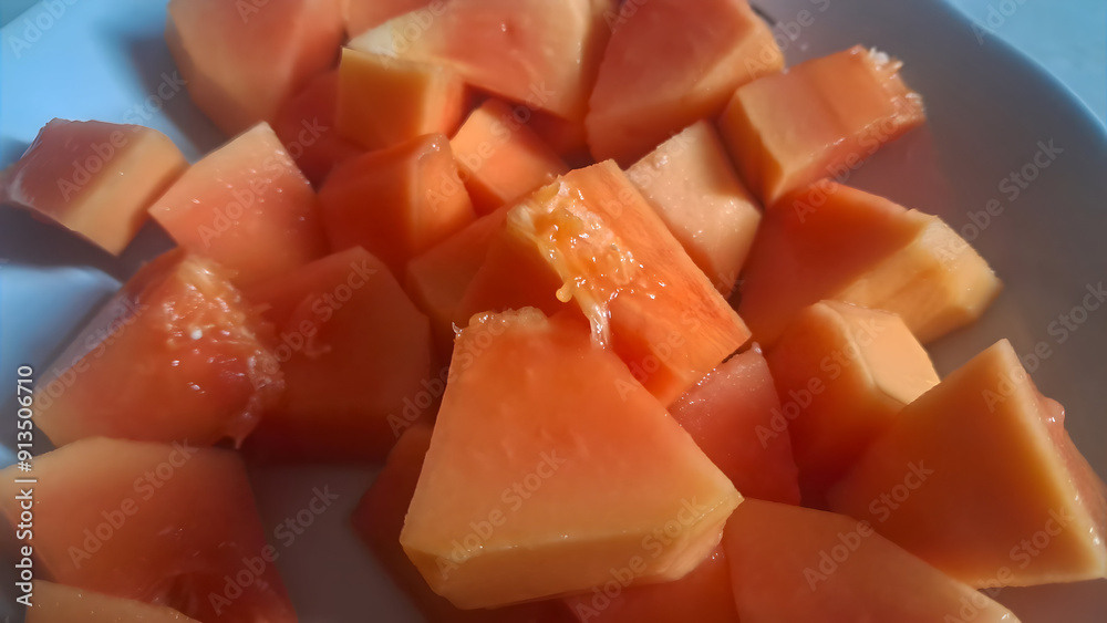 close up view of papaya fruit slice close up view of papaya fruit slice