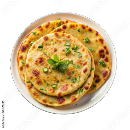 Indian aloo paratha on white plate top view isolated on transparent background