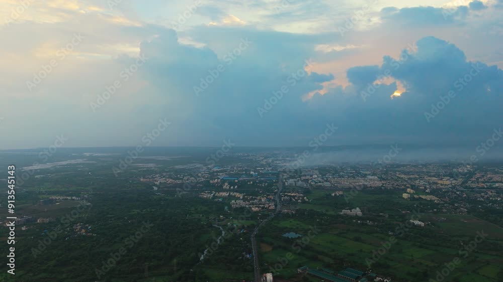 A sprawling cityscape surrounded by greenery at dawn, aerial view, Incredible India A sprawling cityscape surrounded by greenery at dawn, aerial view, Incredible India