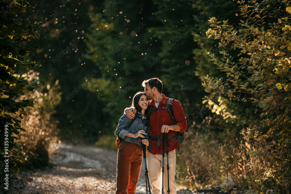 Two friends hikers in the forest, walking and seeking for a good place to camp Two friends hikers in the forest, walking and seeking for a good place to camp