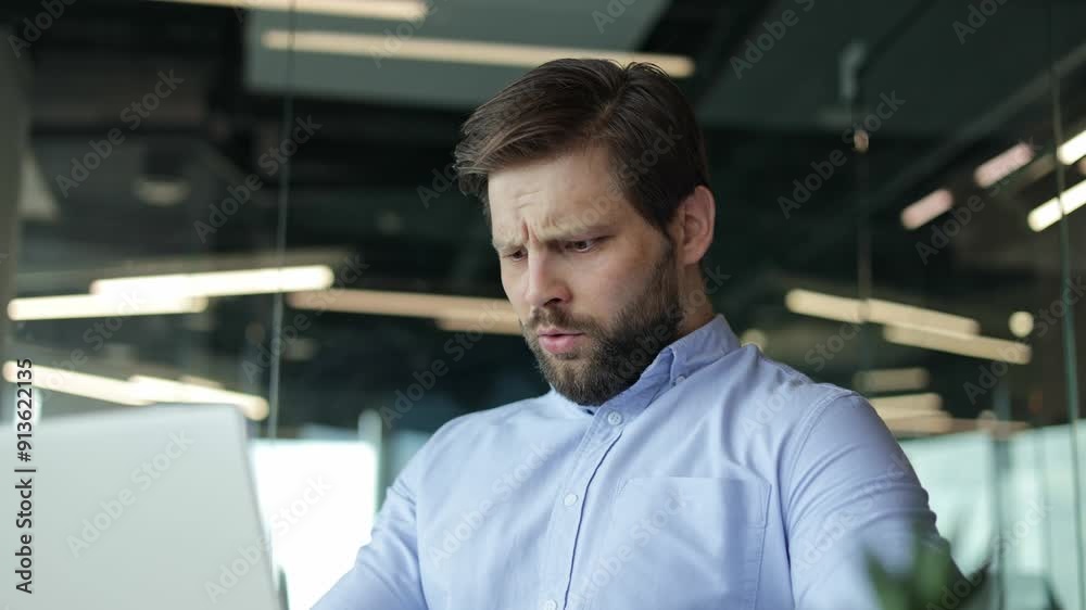 Worried businessman looking at laptop, shocked by bad news online, failure concept. Worried businessman looking at laptop, shocked by bad news online, failure concept.