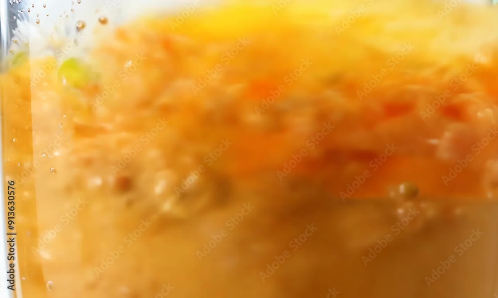 Fruit smoothie in a blender with fresh fruits and vegetables on the table Fruit smoothie in a blender with fresh fruits and vegetables on the table