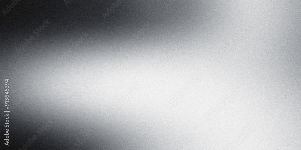 Gradient from black to white on brushed metal texture background Gradient from black to white on brushed metal texture background