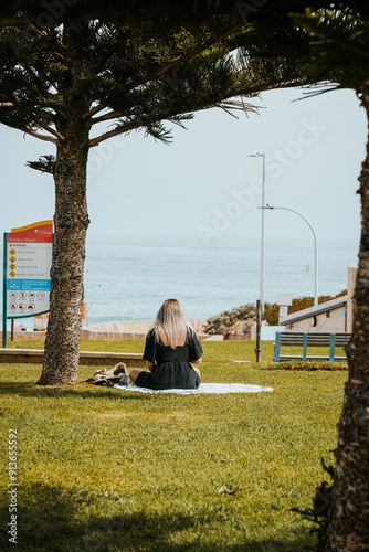 person sitting on a bench photo