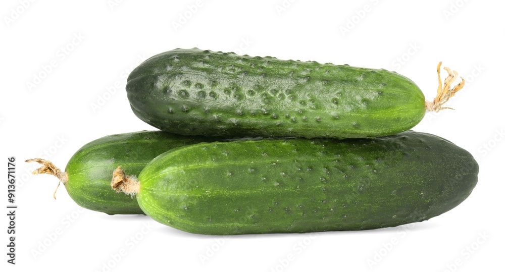 Three fresh green cucumbers isolated on white Three fresh green cucumbers isolated on white