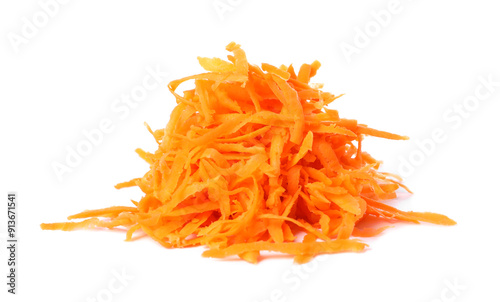 Pile of fresh grated carrot isolated on white photo