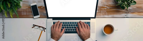 Top View of Hands Typing on a Laptop Keyboard