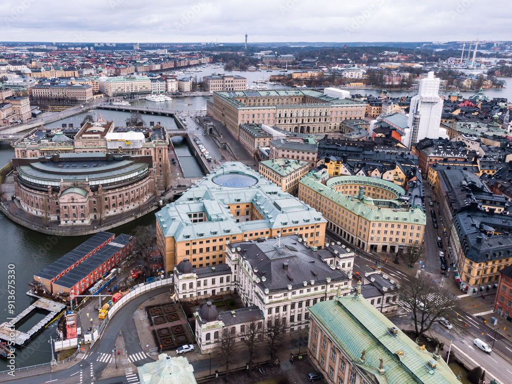 Stockholm, Sweden: Aerial view of the Stockholm Gamla Stan historic district with various landmarks such as the Royal palace and the governement house in, Sweden capital city in winter.