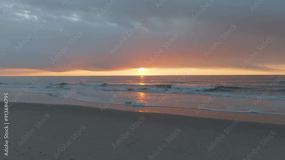 Aerial view of sunset above the beach and ocean in New Jersey Aerial view of sunset above the beach and ocean in New Jersey