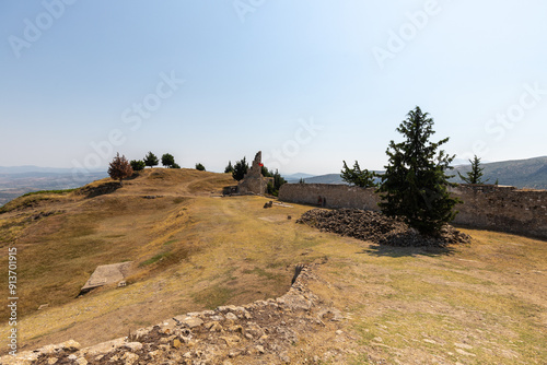 the ruines of Kaninë Castle which was built in the nearby village and the city of Vlore. It is located on the side of the Shushicë Mountain, about 380 metres above sea level and has views on the ocean photo