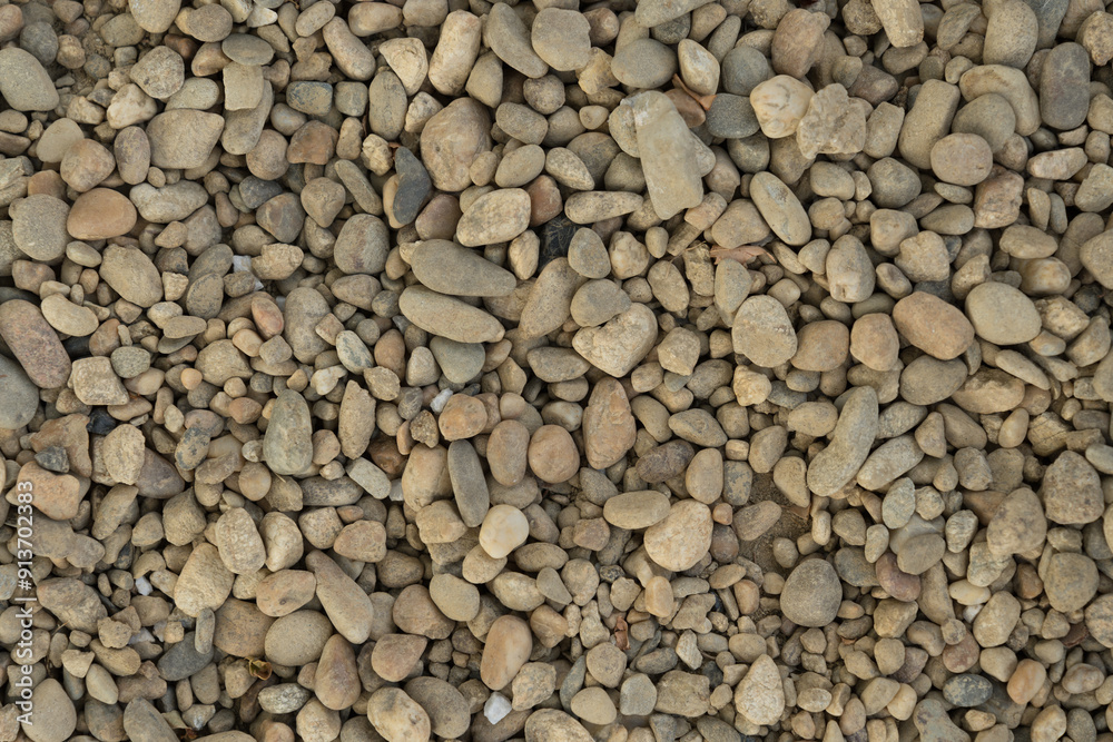 A close-up image of white gravel stones, ideal for backgrounds, textures, and construction-related themes. A close-up image of white gravel stones, ideal for backgrounds, textures, and construction-related themes.