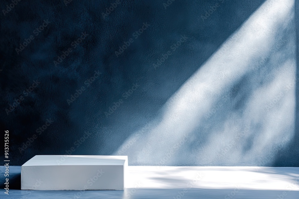 Minimal White Steel Table Corner with Light Beam, Shadow, and Spotlight on the Navy Blue Concrete Wall Background