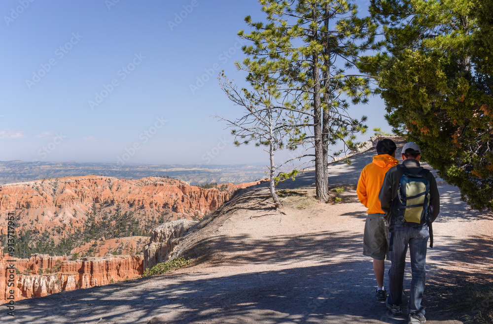Tourists walking on Bryce Canyon Rim Trail. Bryce Canyon National Park. Utah. USA.
