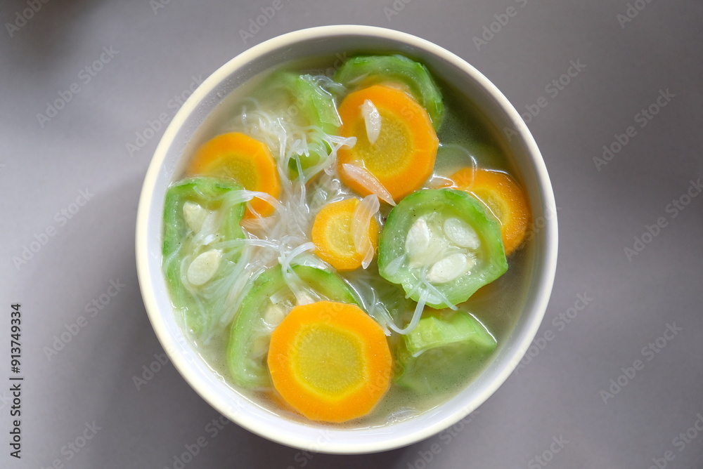 Vegetable soup made from vermicelli, carrot, and green luffa or oyong or gambas. Vegetable soup made from vermicelli, carrot, and green luffa or oyong or gambas.