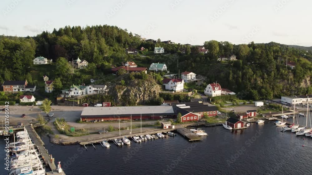 Panoramic View of Docked Yachts, Speedboats, and Villas at the Marina in Ljungskile, Bohuslän, Sweden - Aerial Drone Shot Panoramic View of Docked Yachts, Speedboats, and Villas at the Marina in Ljungskile, Bohuslän, Sweden - Aerial Drone Shot