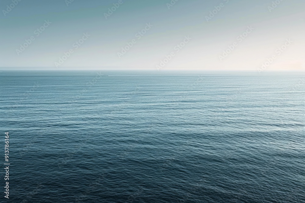 A minimalist seascape with an expansive horizon stretching towards infinity. The image captures the vastness of the open ocean, utilizing calming tones and soft gradients reminiscent of the seascapes A minimalist seascape with an expansive horizon stretching towards infinity. The image captures the vastness of the open ocean, utilizing calming tones and soft gradients reminiscent of the seascapes