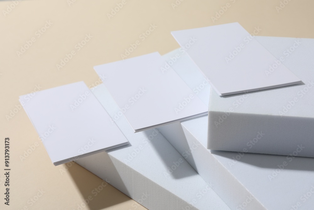Blank business cards on beige background. Mockup for design Blank business cards on beige background. Mockup for design