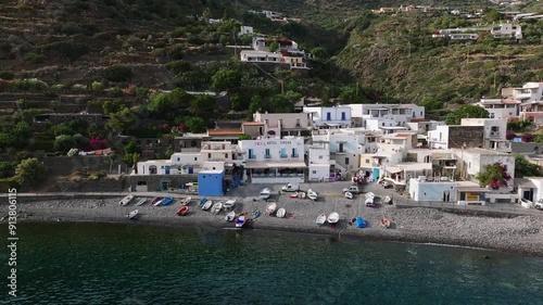 4K Aerial of Filicudi volcanic island. Slow descend over town, Italy