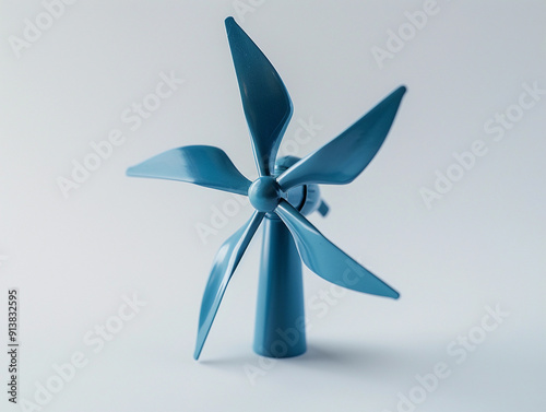 Creative Blue Plastic Wind Turbine Model on White Surface for Educational Purposes