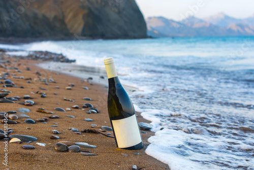 Bottle of wine by the sea