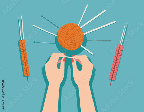 Knitting process, top view on hands holding needles