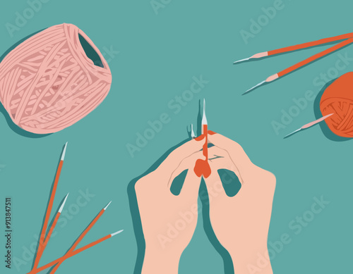 Knitting process, top view on hands holding needles