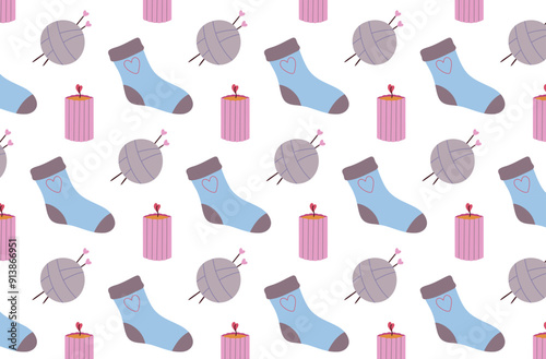 Seamless pattern with a ball of thread, socks, a candle.