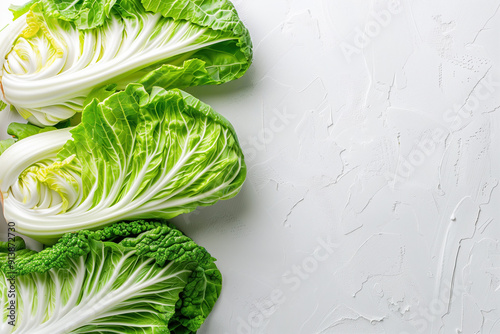 Close-Up View of Fresh Chinese Cabbage Group on White Background Emphasizing Organic Quality and Nutritional Value for Recipes photo