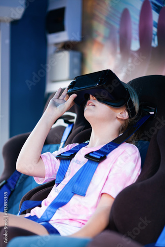 Girl in VR glasses, virtual reality attraction
