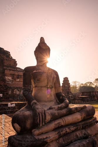 Buddha statue at sunset, Ayutthaya park, Thailand