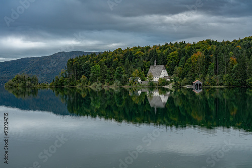 Fototapeta Naklejka Na Ścianę i Meble -  Panoramic view of a picturesque lake in the morning light, fog, meadows and morning light, spring rural landscape