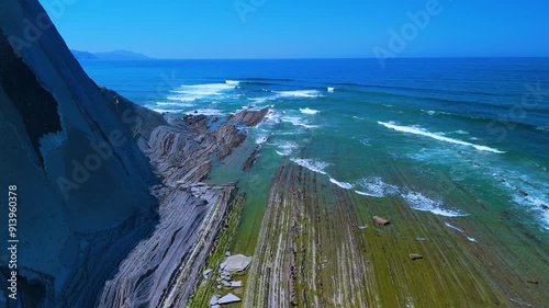 Rising tide on the Sakoneta Flysch. Aerial view from a drone on the Cantabrian Coast in Deva. Cantabrian Sea. Gipuzkoa Province. Basque Country. Spain. Europe photo