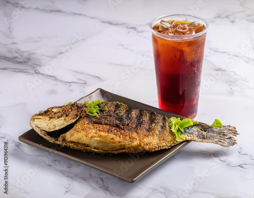 spicy fish fried slice dark background. ai generated photo