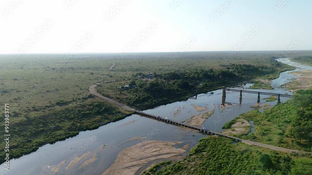 Cars Crossing the Bridge out of Kruger National Park, Aerial View - 4k Cars Crossing the Bridge out of Kruger National Park, Aerial View - 4k