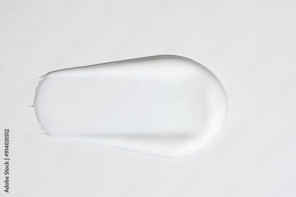 Texture of white cream on white background. Smear of moisturizer close up. Lotion swatch. Beauty skin care product smear smudge. SPF sunscreen cream sample on white Texture of white cream on white background. Smear of moisturizer close up. Lotion swatch. Beauty skin care product smear smudge. SPF sunscreen cream sample on white