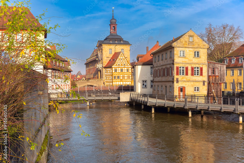 Fototapeta premium View of Bamberg Old Town Hall and surrounding buildings along the Regnitz River in Bamberg, German