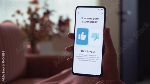 Pressing the thumbs up button leaving good customer feedback. Customer satisfaction concept. Fictional Interface.