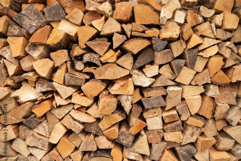 view of stacked loggs of fire wood view of stacked loggs of fire wood