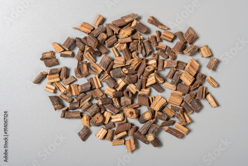 top view herb ShouWuTeng or Tuber Fleeceflower Stem or Polygoni Multiflori Caulis on grey background photo