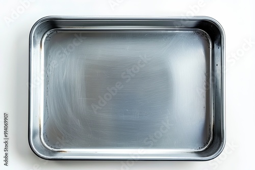 Empty metal tray from above on white background