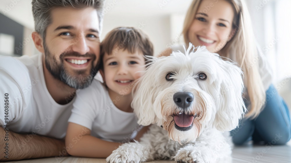 Parents and child with their dog, enjoying time on the floor, smiling and embracing, cozy and modern home, with copy space Parents and child with their dog, enjoying time on the floor, smiling and embracing, cozy and modern home, with copy space