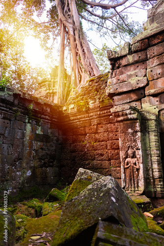 Angkor Thom, ancient temple ruins in Cambodia jungle with tree roots