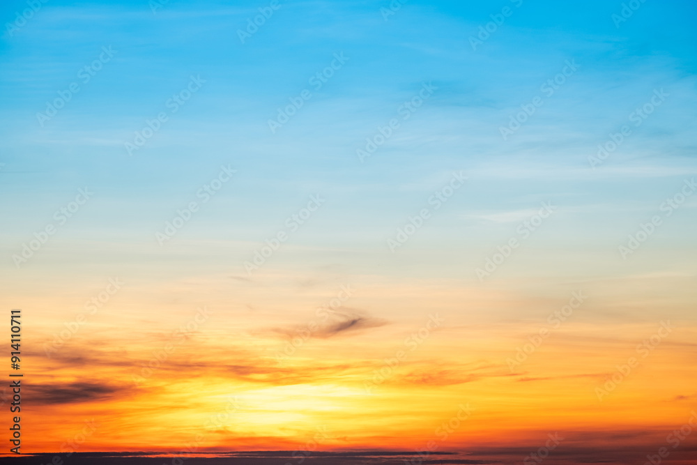 Beautiful , luxury soft gradient orange gold clouds and sunlight on the blue sky perfect for the background, take in everning,Twilight, Large size, high definition landscape photo Beautiful , luxury soft gradient orange gold clouds and sunlight on the blue sky perfect for the background, take in everning,Twilight, Large size, high definition landscape photo