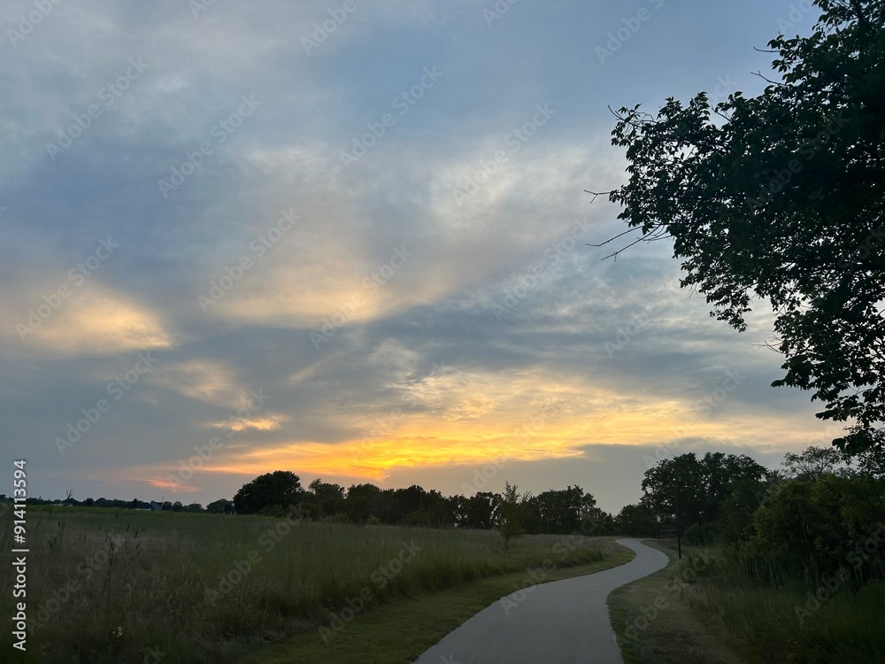 sunset over park trail sunset over park trail