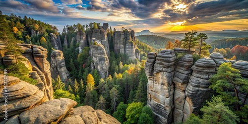 Majestic sandstone cliffs rise above a serene forest floor, framing the entrance to a mystical rock labyrinth in the breathtaking Bohemian Paradise nature reserve. photo